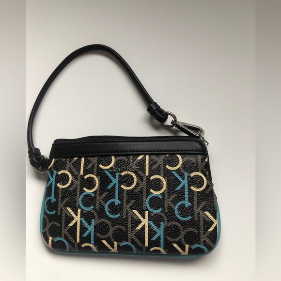 Calvin Klein Handbags - NWOT Calvin Klein mini Clutch